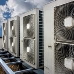 Air conditioning system assembled on top of a building