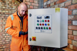Welch Refrigeration engineer servicing industrial refrigeration system at Peake Fruit in Colchester, Essex